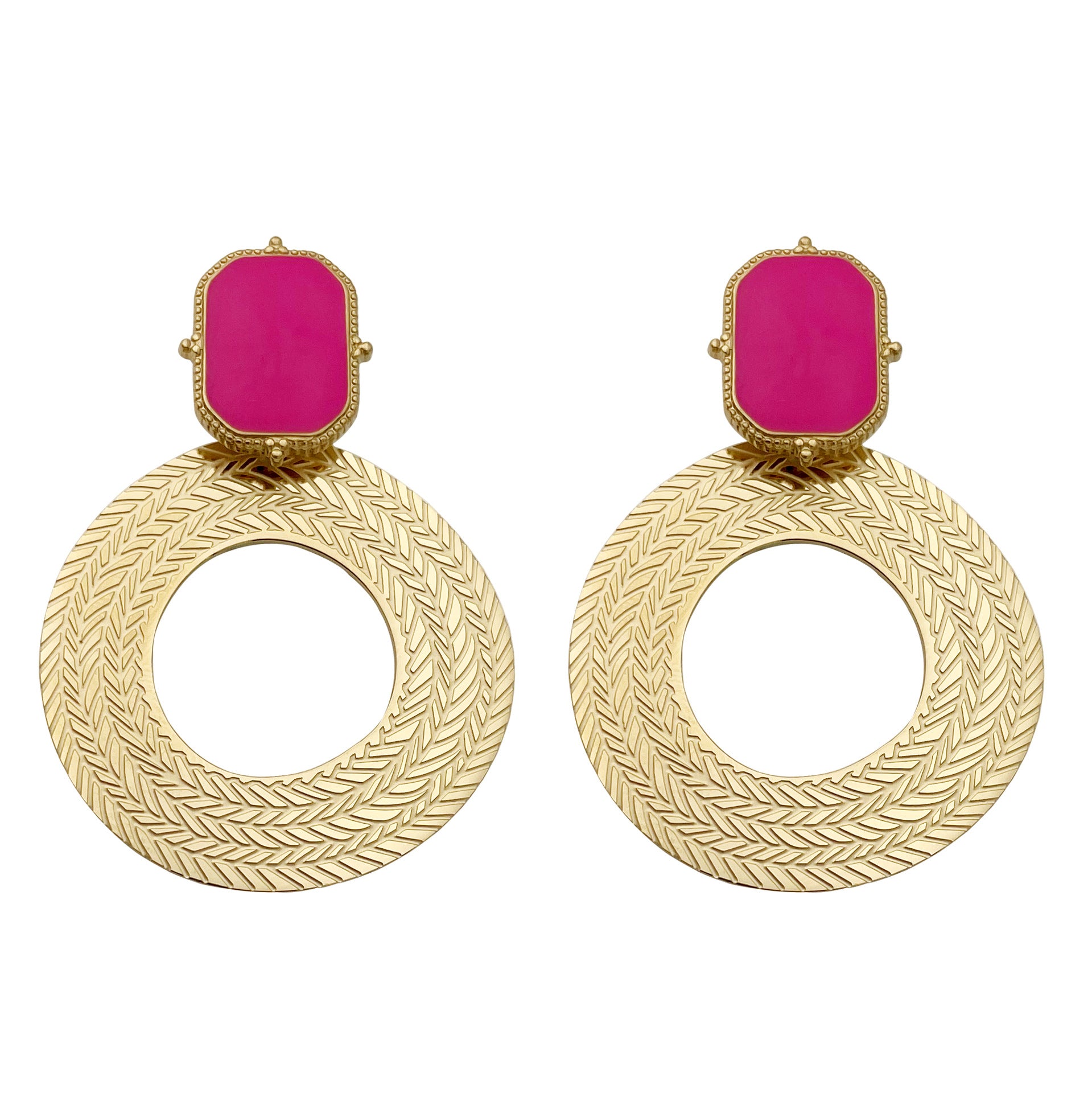 Gold earrings with pink gemstones on a white background