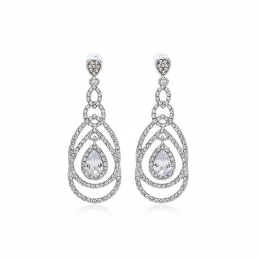 Silver teardrop earrings with clear stones on a white background