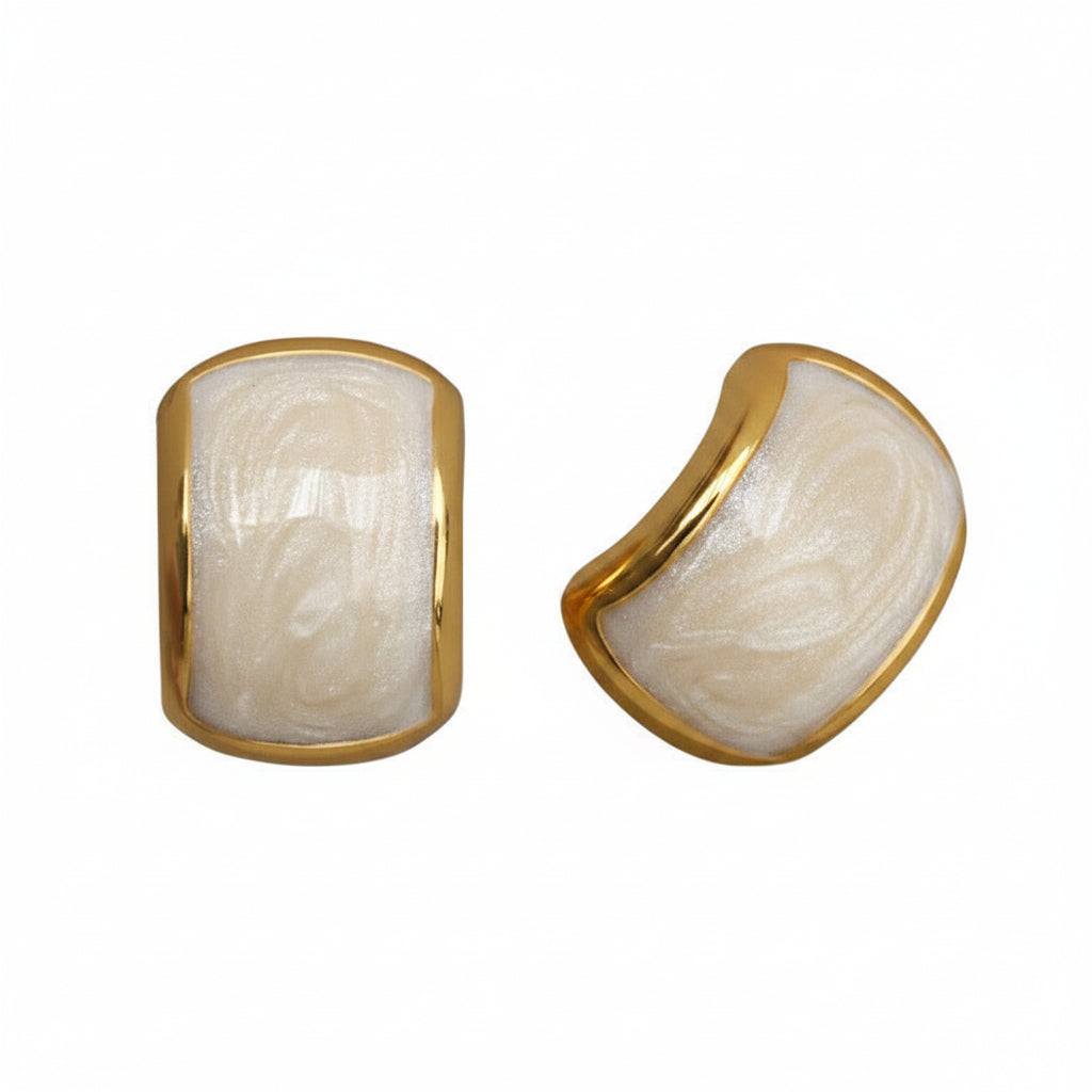 Pair of earrings with gold and beige design on a white background